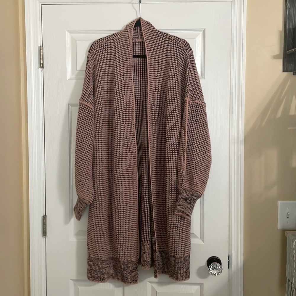 Women’s pink and black cardigan